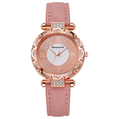 Korean-style quartz watch with a simple leather strap.